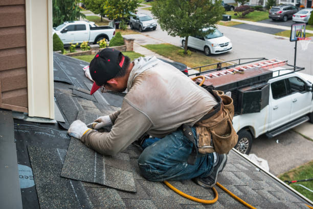 Professional Roofing technician working in Roseville, MN